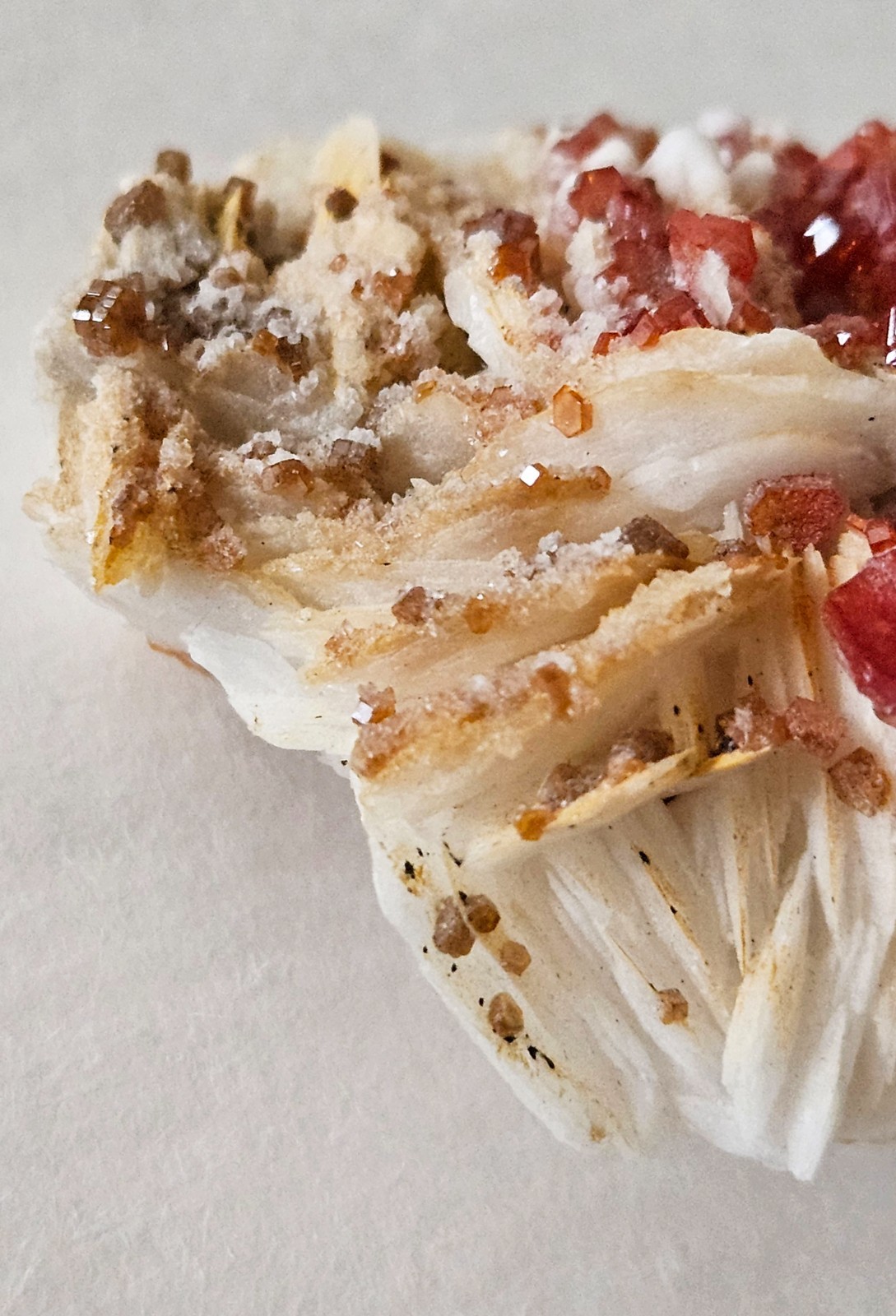 Red and Brown Vanadinite Crystals on white Barite – Mibladen, Morocco