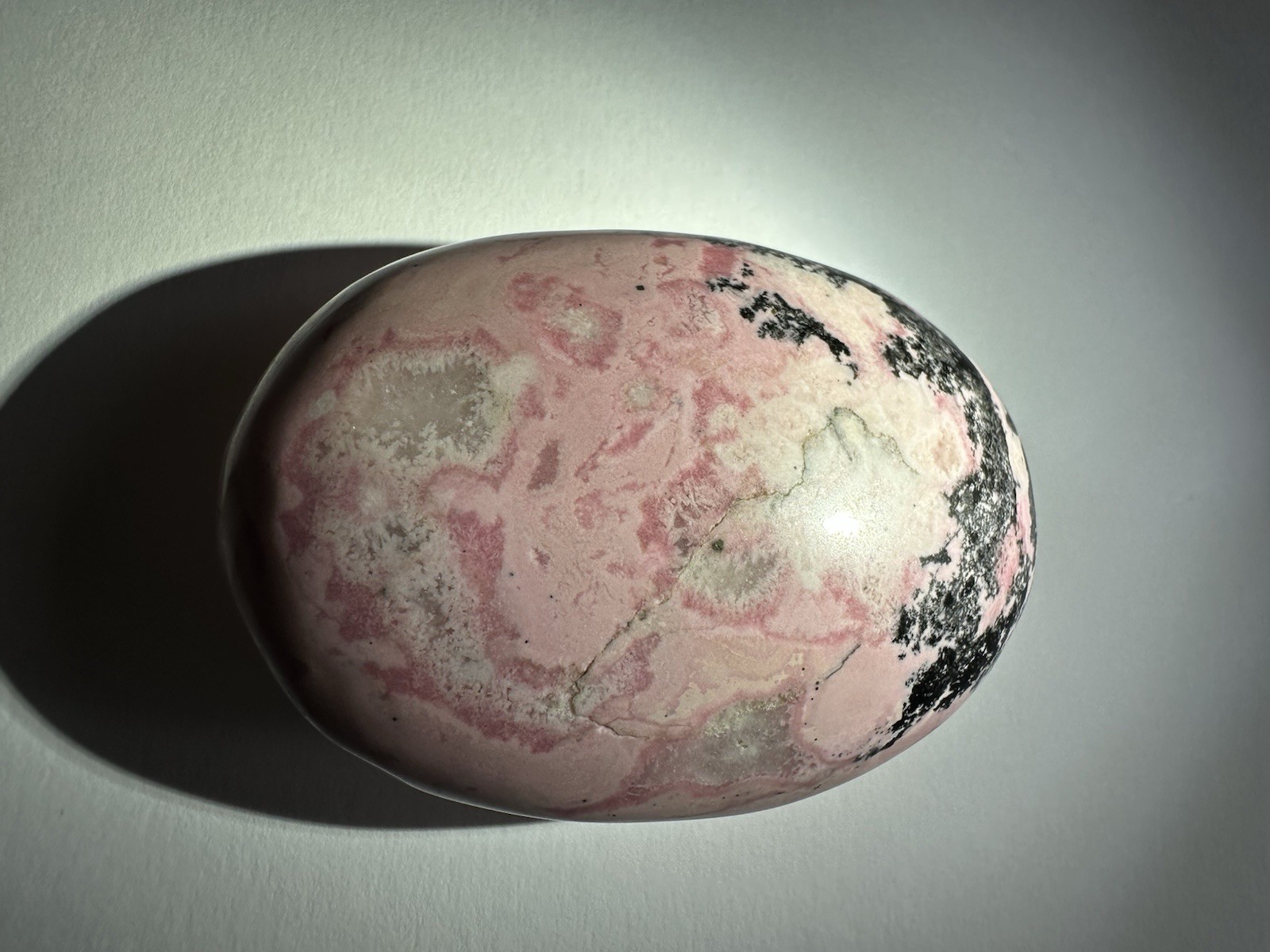 Polished Pink Rhodonite Palm Stone, Oval Egg Shape Mineral Specimen, 3 in