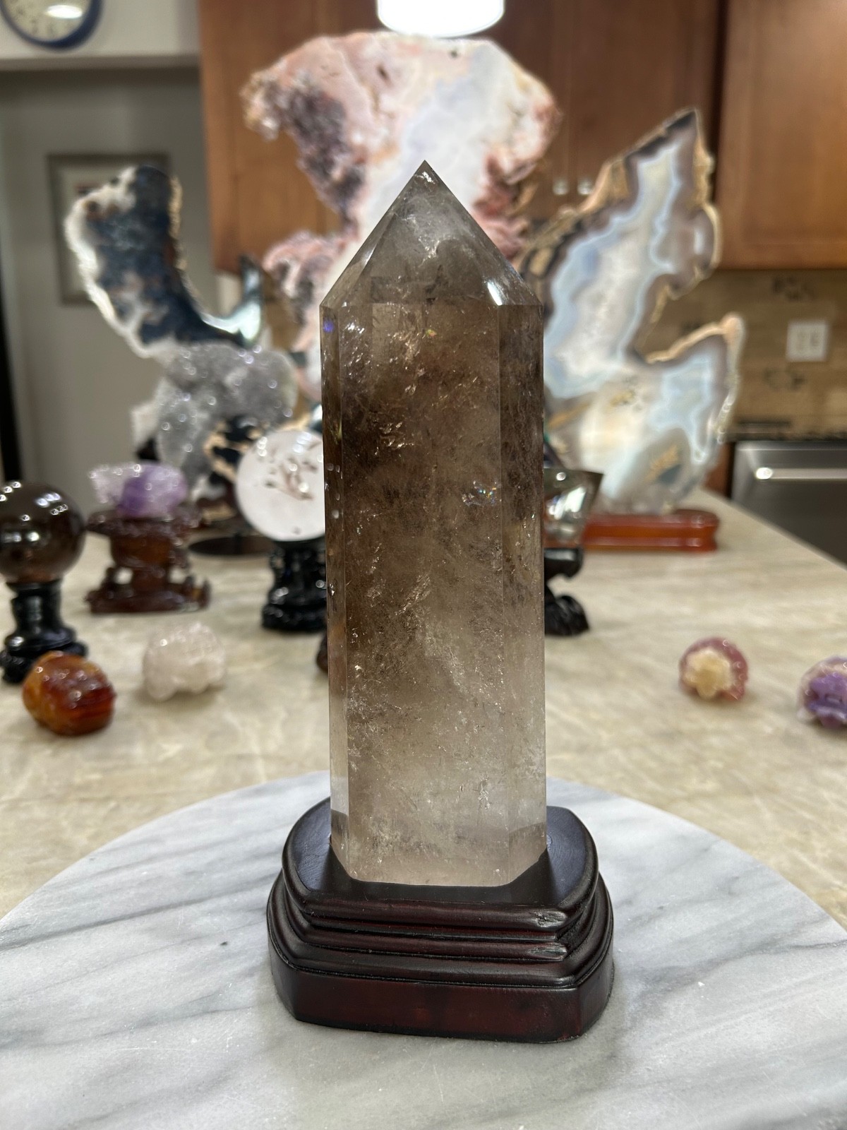 Smoky quartz tower with custom wood stand