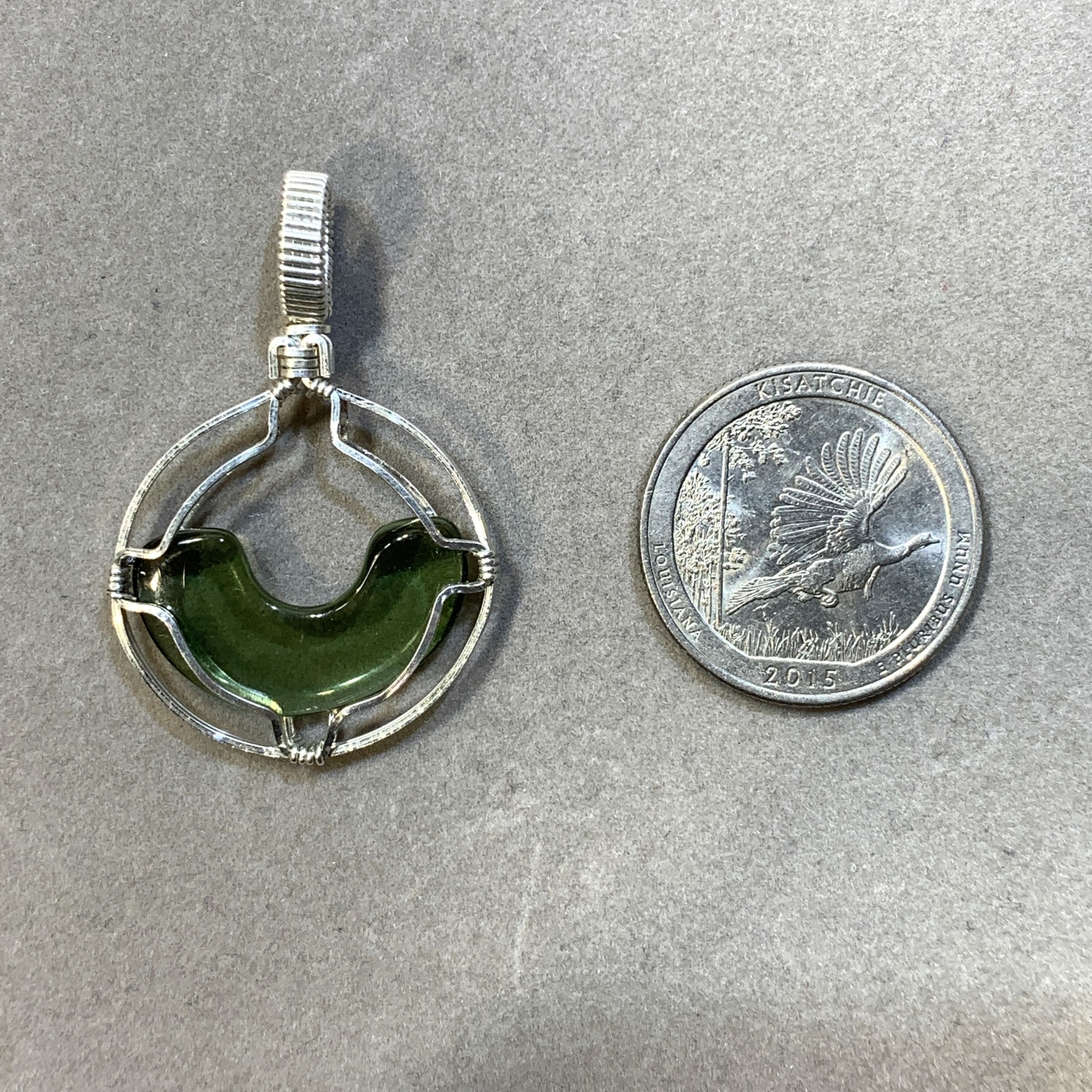 Moldavite pendant (polished) ‘smiley’