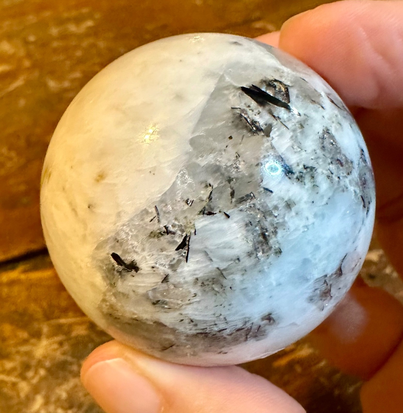 Moonstone sphere with tourmaline inclusions and metal horse stand Free shipping