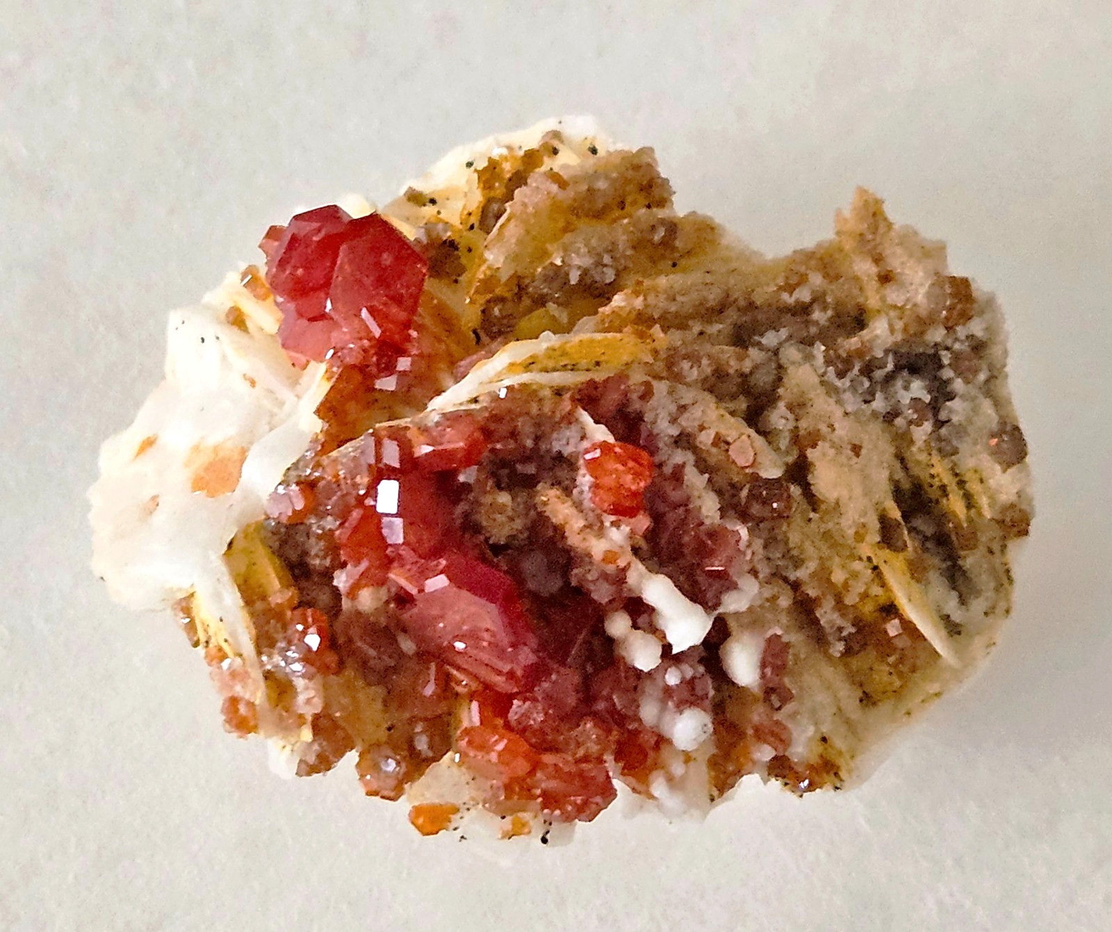 Red and Brown Vanadinite Crystals on white Barite – Mibladen, Morocco