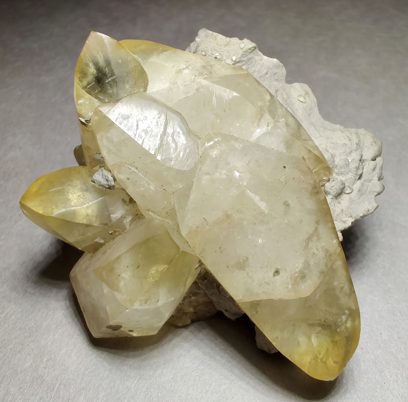 Calcite crystals on Limestone matrix, fluorescent. Indiana. 101 grams.