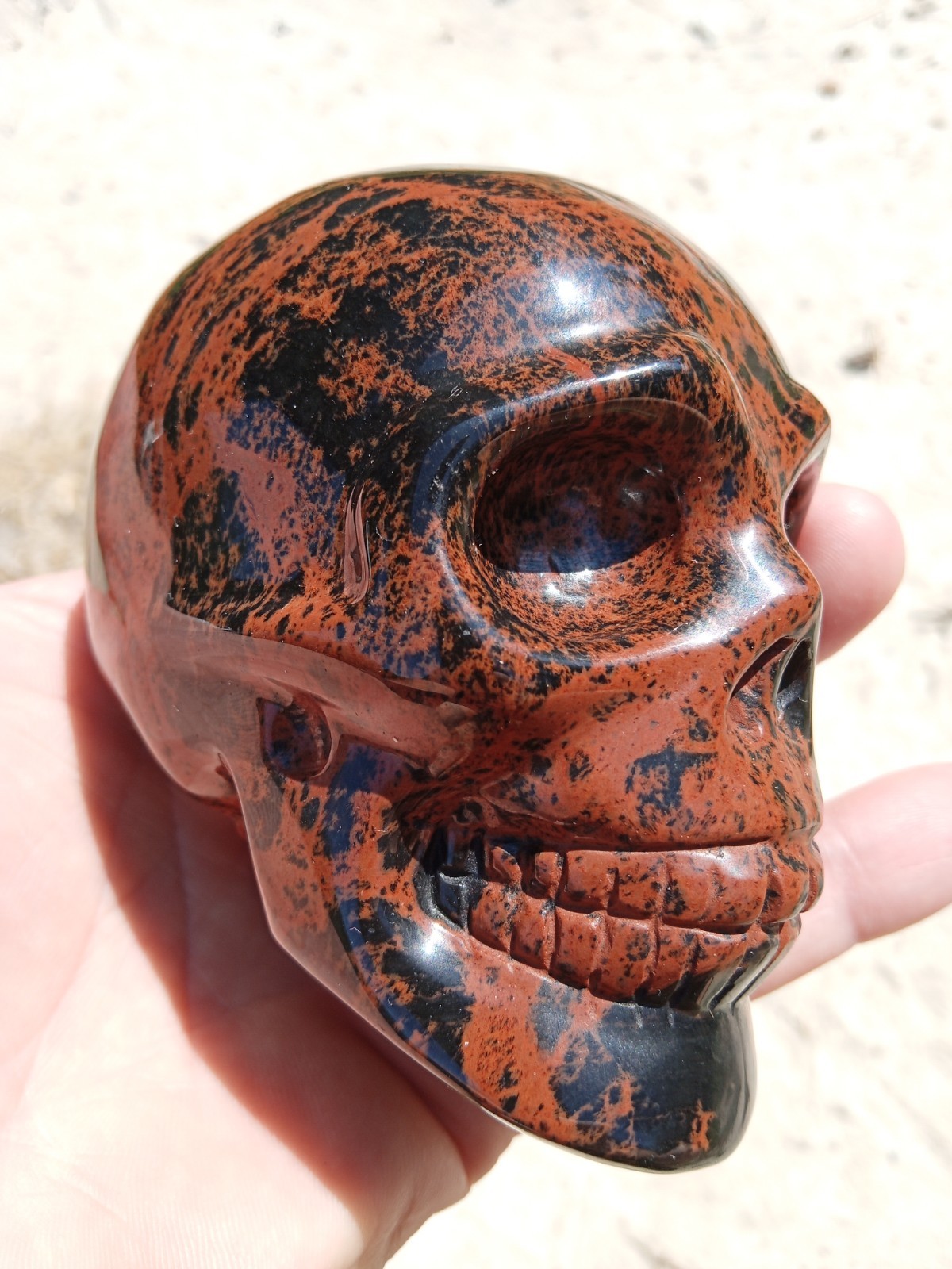 Beautiful Mahogany Obsidian Crystal Skull Carving. 3.75″. Over 1 pound! SK4