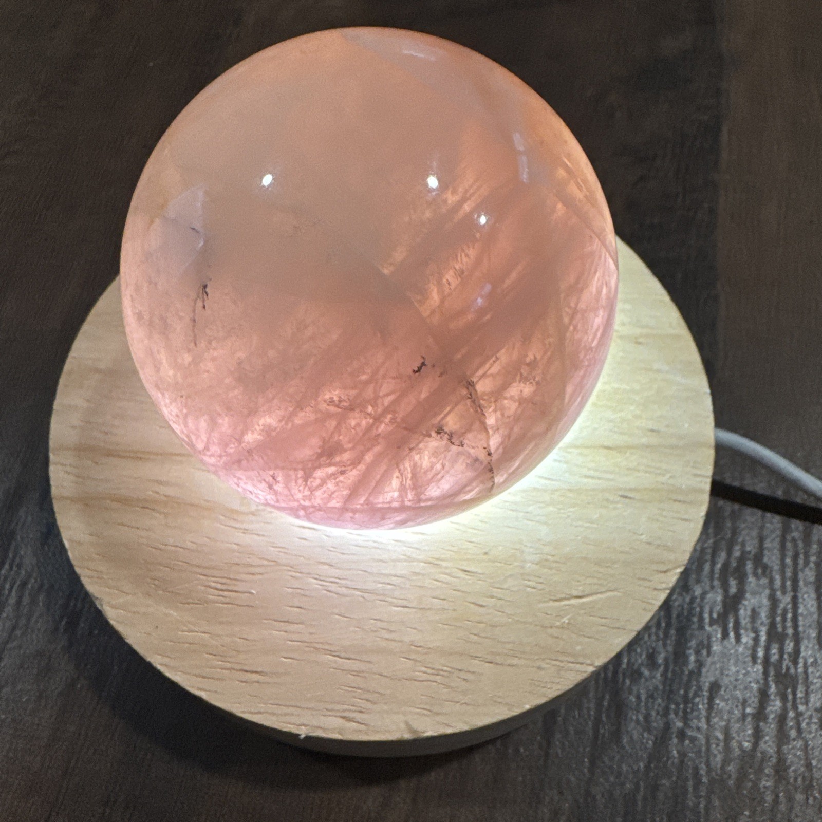 Rose Quartz Crystal Sphere On Lighted Stand 289 Grams 59 mm