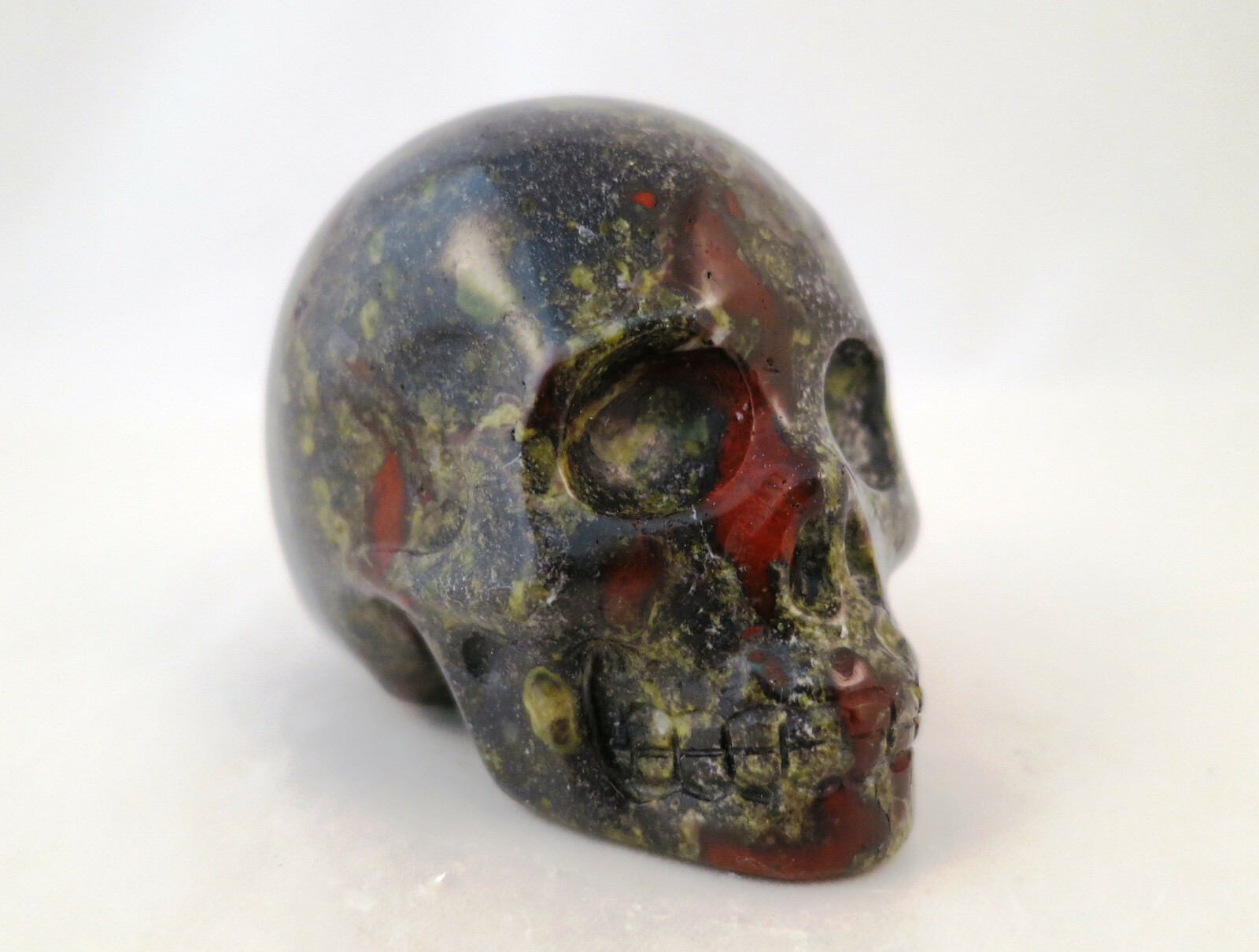 2.1″ DRAGON BLOODSTONE Carved and Polished SKULL