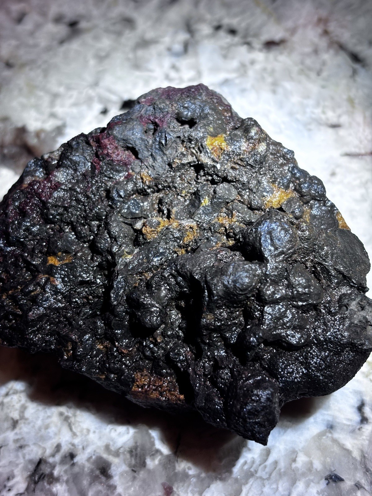 this rock looks like it came from hell! iron ore or silver ore ? meteorite?