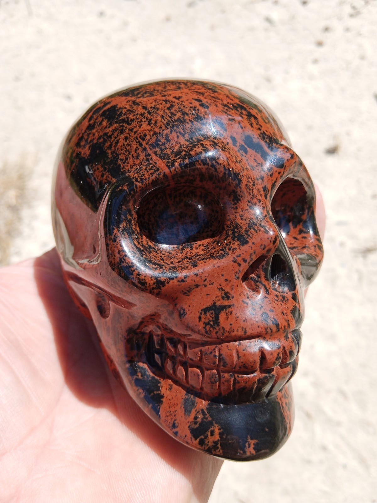 Beautiful Mahogany Obsidian Crystal Skull Carving. 3.75″. Over 1 pound! SK4