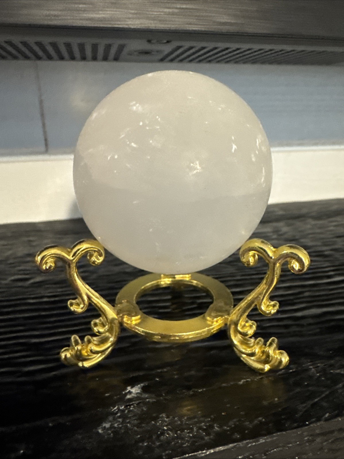 Selenite Crystal Sphere On Gold Metal Stand 226 Grams 22 mm
