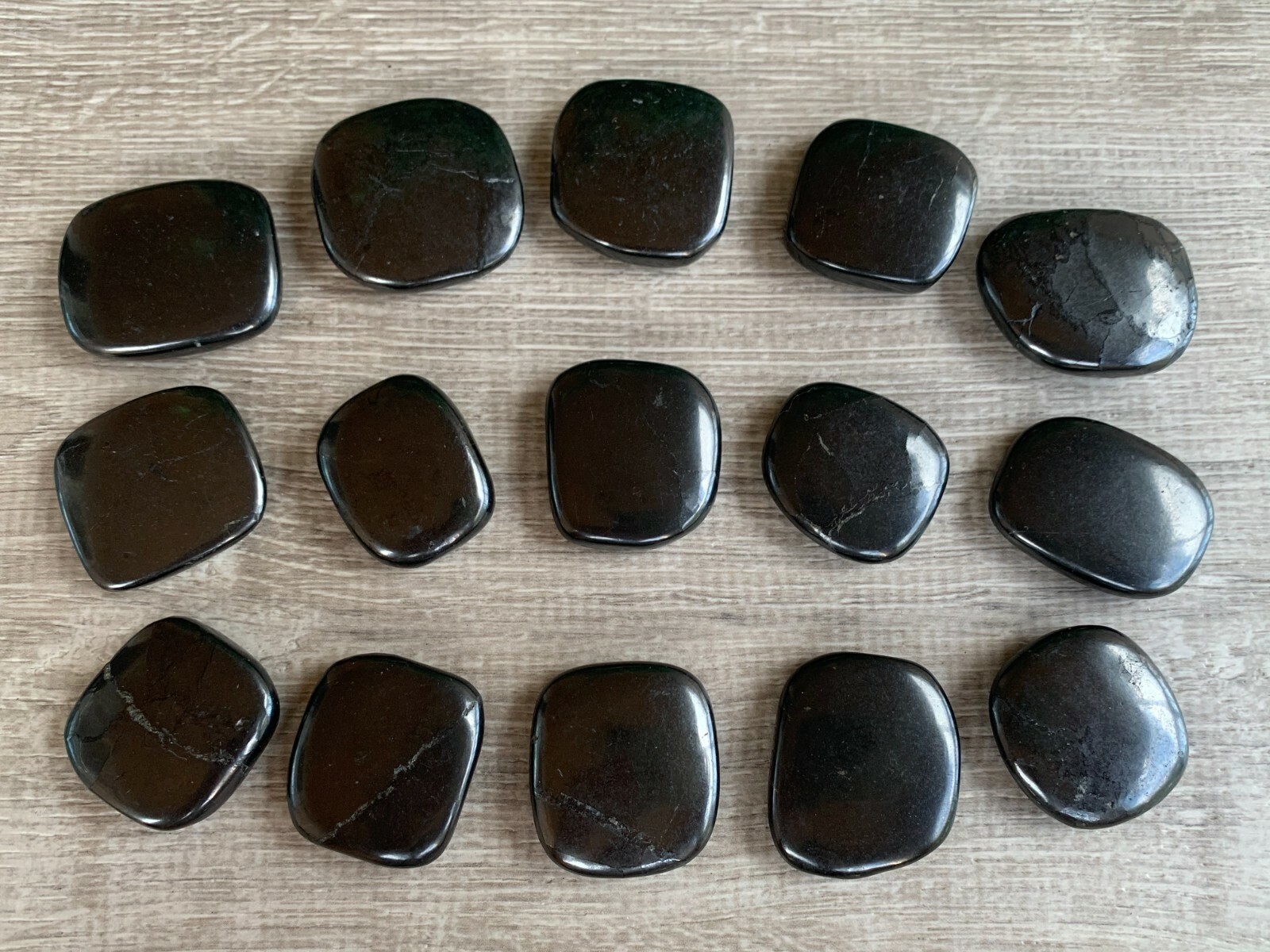 Shungite Smooth Stones, 1.25″-1.75″ Polished Shungite Palm Stones, Wholesale Lot