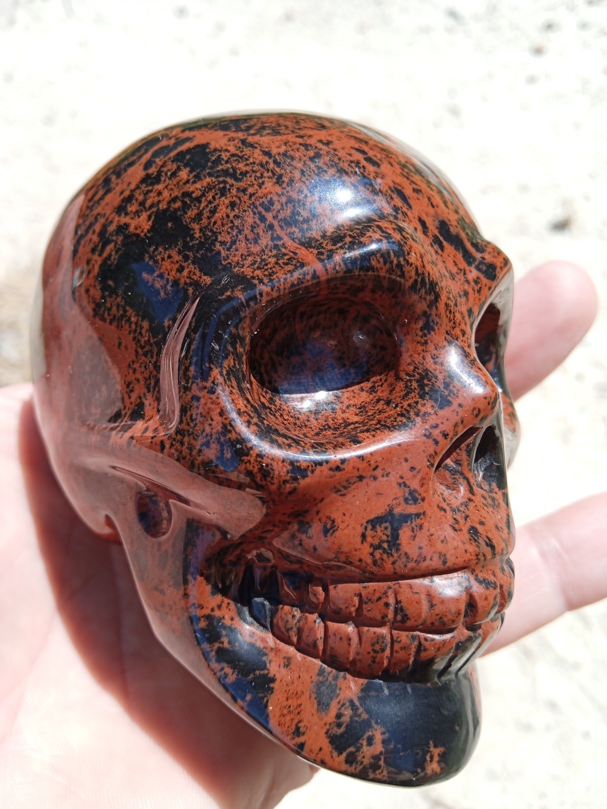 Beautiful Mahogany Obsidian Crystal Skull Carving. 3.75″. Over 1 pound! SK4