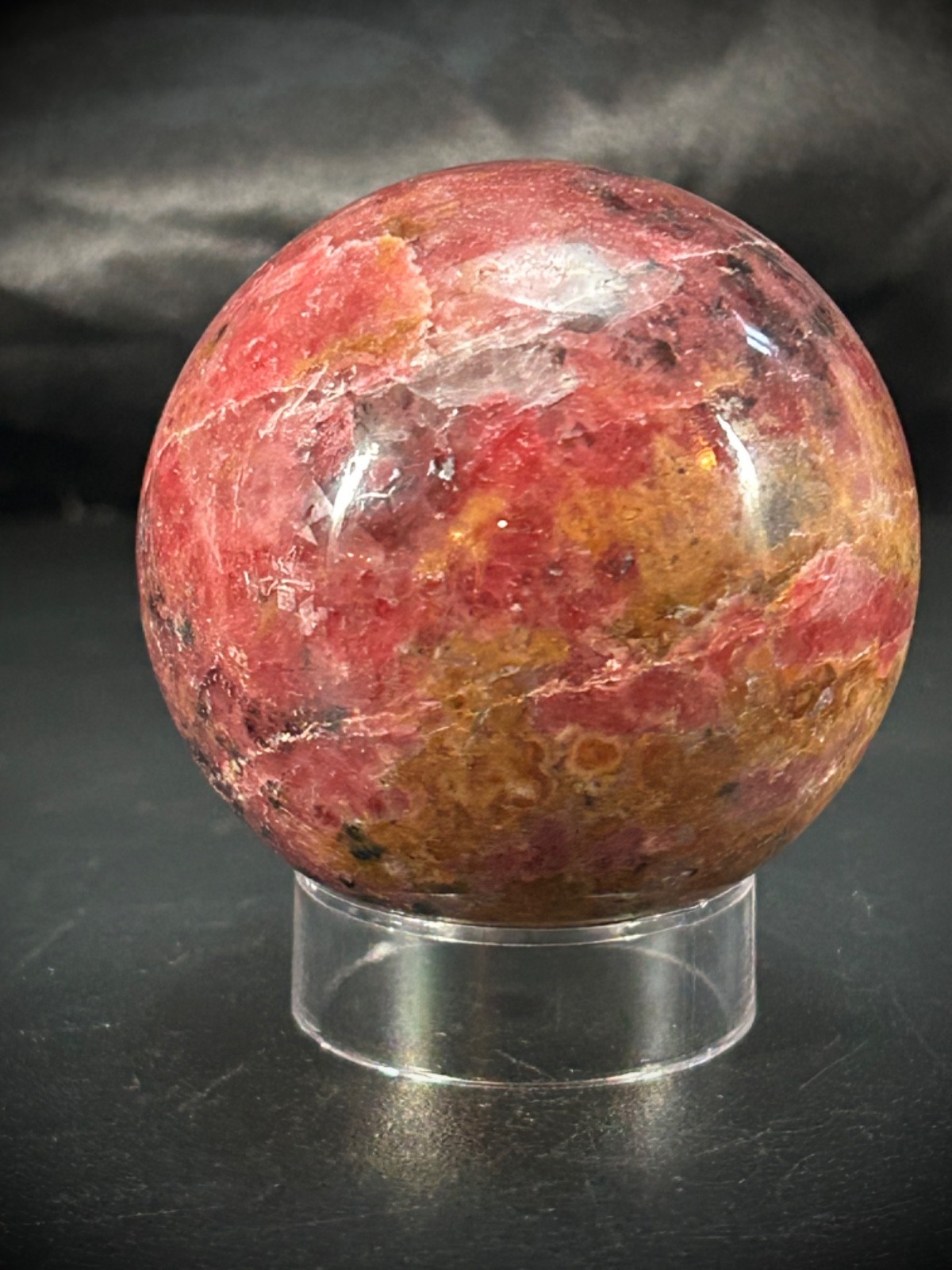 2.06″ Rhodonite Sphere With Acrylic Stand 9.9oz (281 grams)