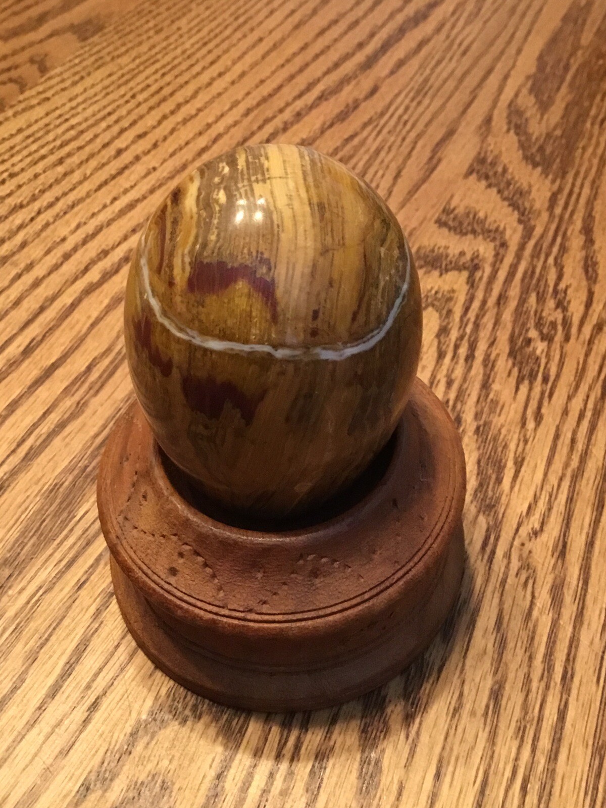 Onyx Naturally Banded Polished Egg With Wooden Stand
