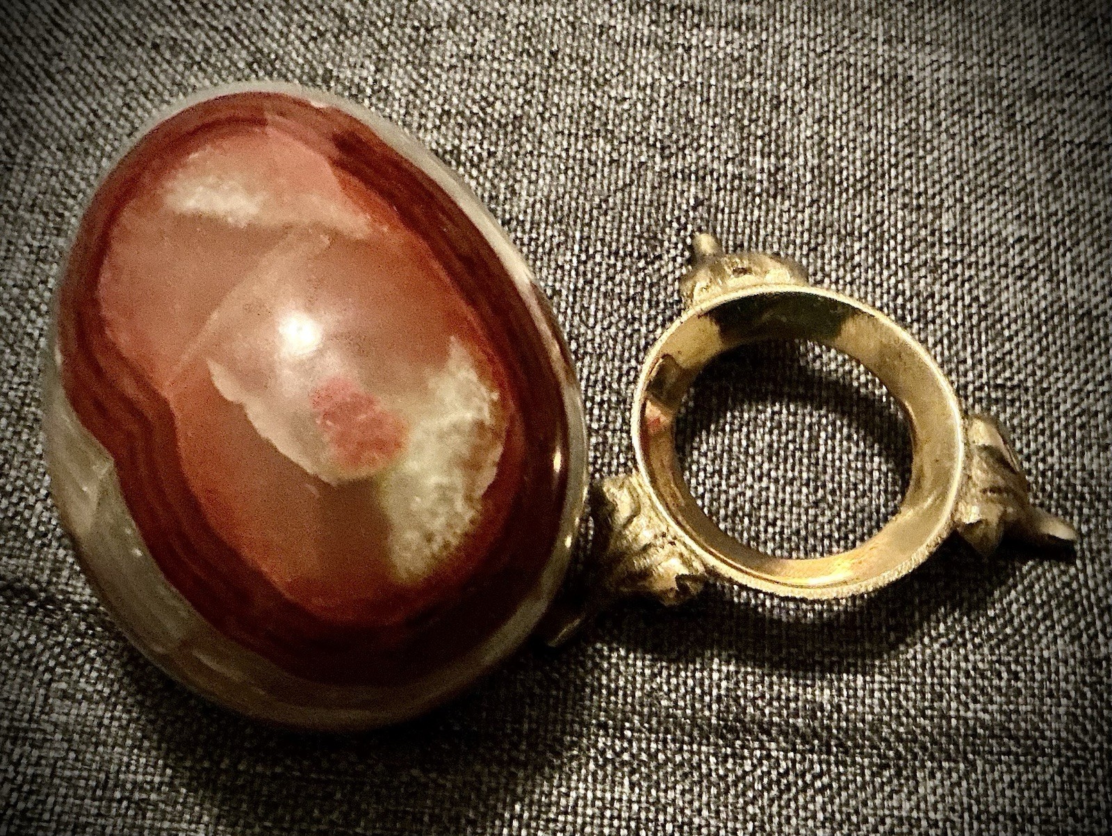 Polished Banded Onyx Egg On Brass Stand