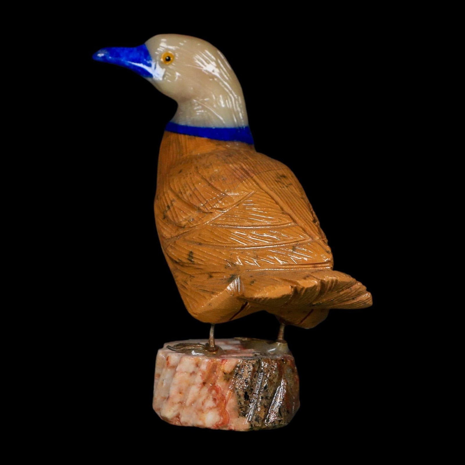 3.5″ Hand Carved Duck Perched on Red White Calcite, Brown Calcite, And Sodalite