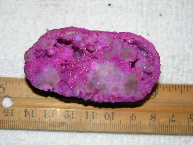 Geode cut & polished half with colored crystal center 2.5 inch E88