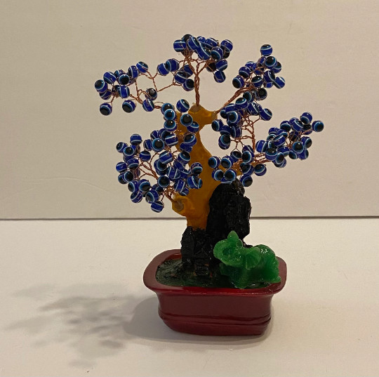 An elegant Blue Cat’s Eye Tree with Elephant.It brings luck, prosperity, provide