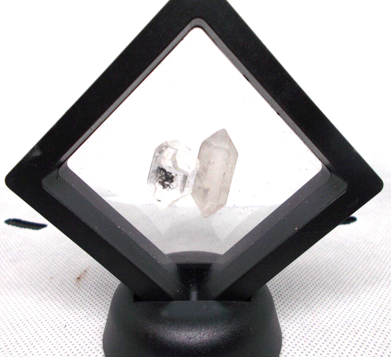 2 Hermiker diamonds 1″ x 1/2″ in display frame
