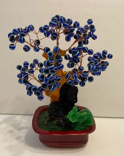 An elegant Blue Cat’s Eye Tree with Elephant.It brings luck, prosperity, provide