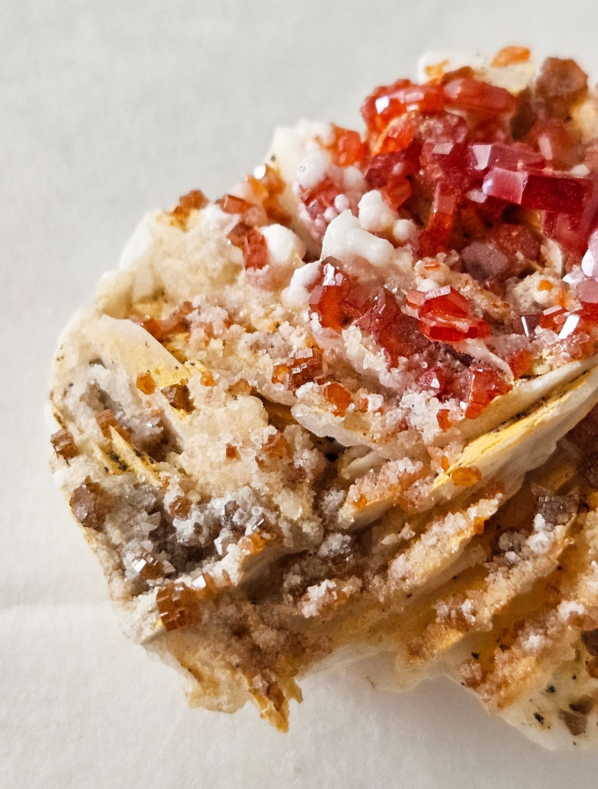 Red and Brown Vanadinite Crystals on white Barite – Mibladen, Morocco