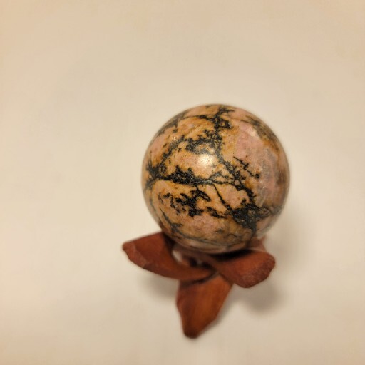 Rhodonite Sphere Polished Rock Pink Gemstone With Wooden Tripod Stand