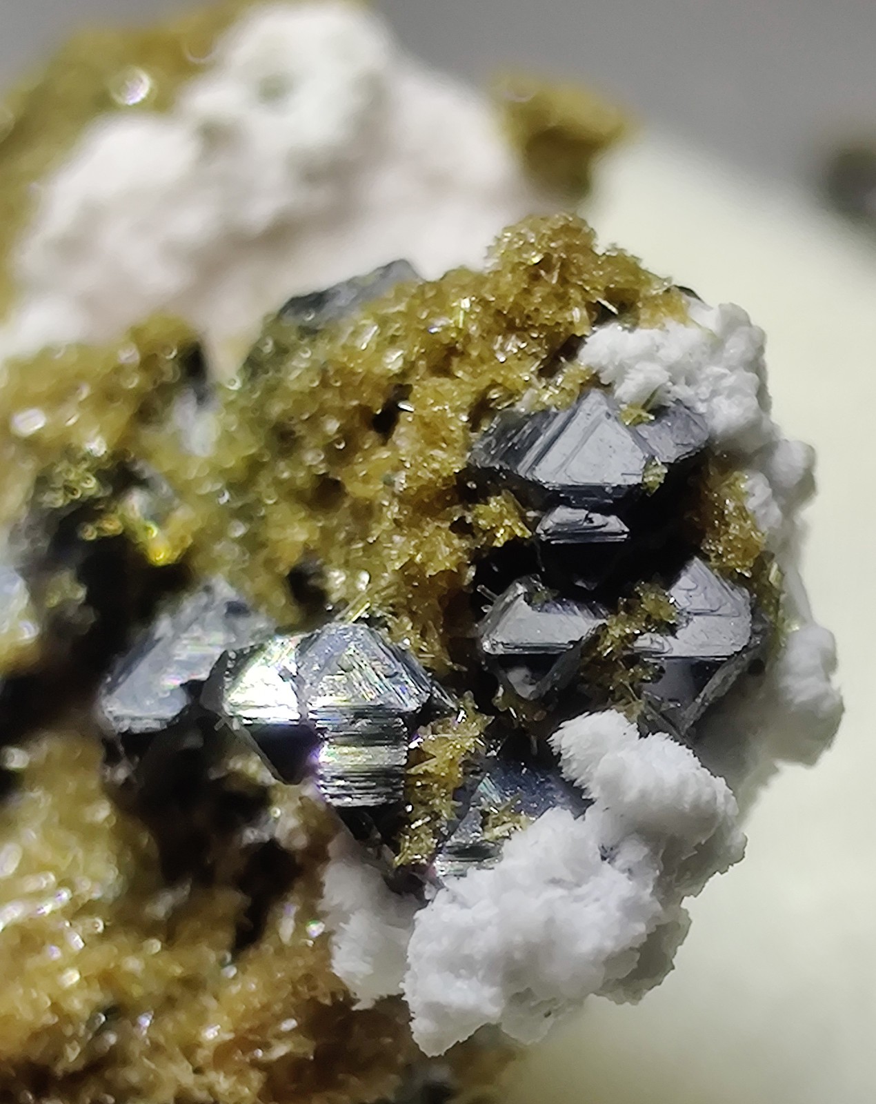 Epidote, Sphalerite, Chalcopyrite crystals etc. Silverton, Colorado. 2.2 cm.