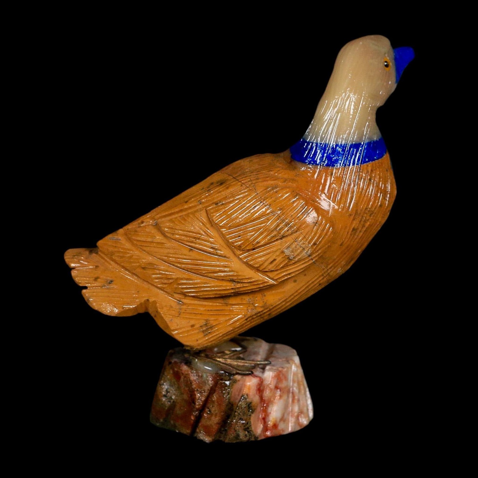 3.5″ Hand Carved Duck Perched on Red White Calcite, Brown Calcite, And Sodalite