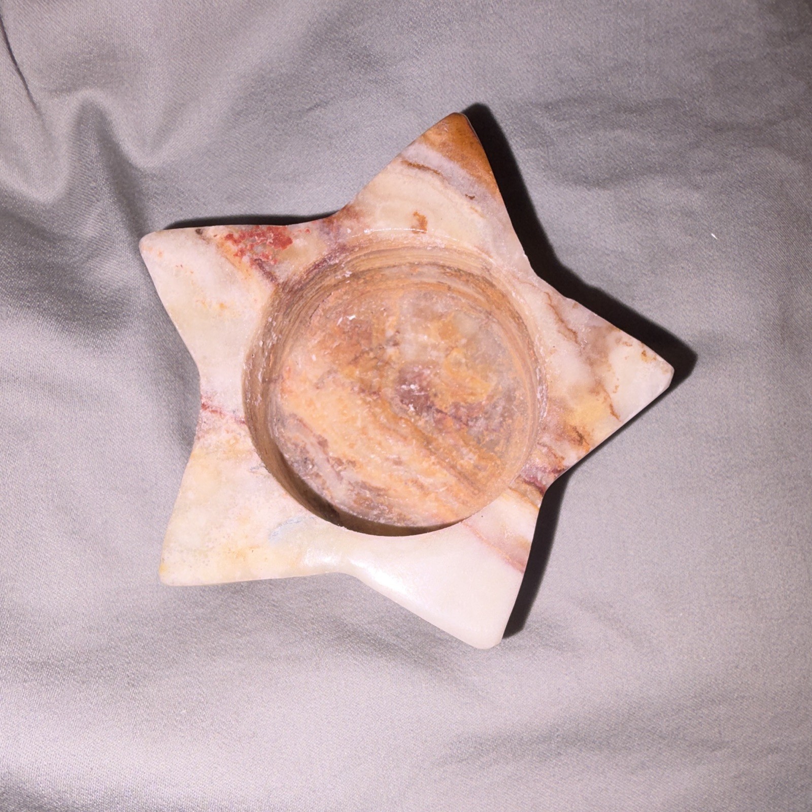 Star-Shaped Carved green onyx candle holder – White & Brown Marbled Stone Design