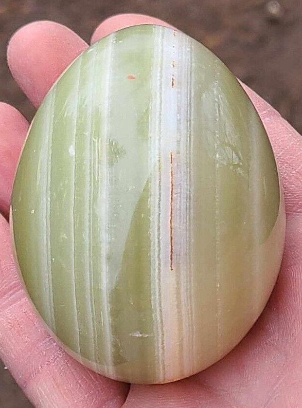 Green Onyx Egg Stone with brown marking. The egg is ~2-3/8″ long and 2″ wide.