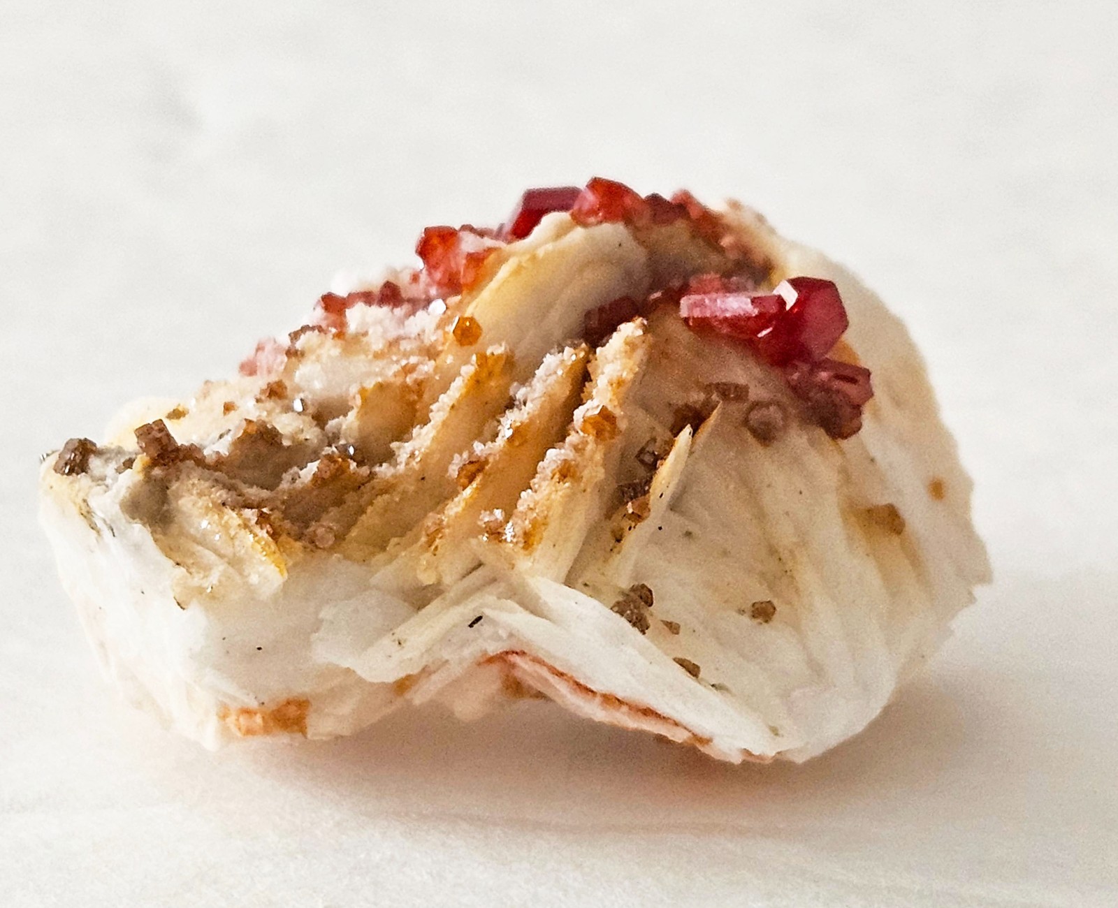 Red and Brown Vanadinite Crystals on white Barite – Mibladen, Morocco