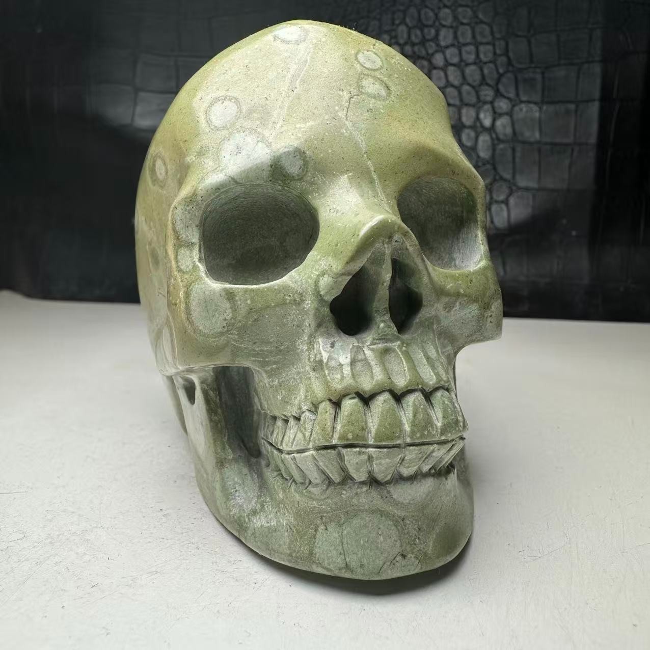 780g Natural Crystal Mineral Specimen.Plum blossom stone.Hand-carved SKULL.BD
