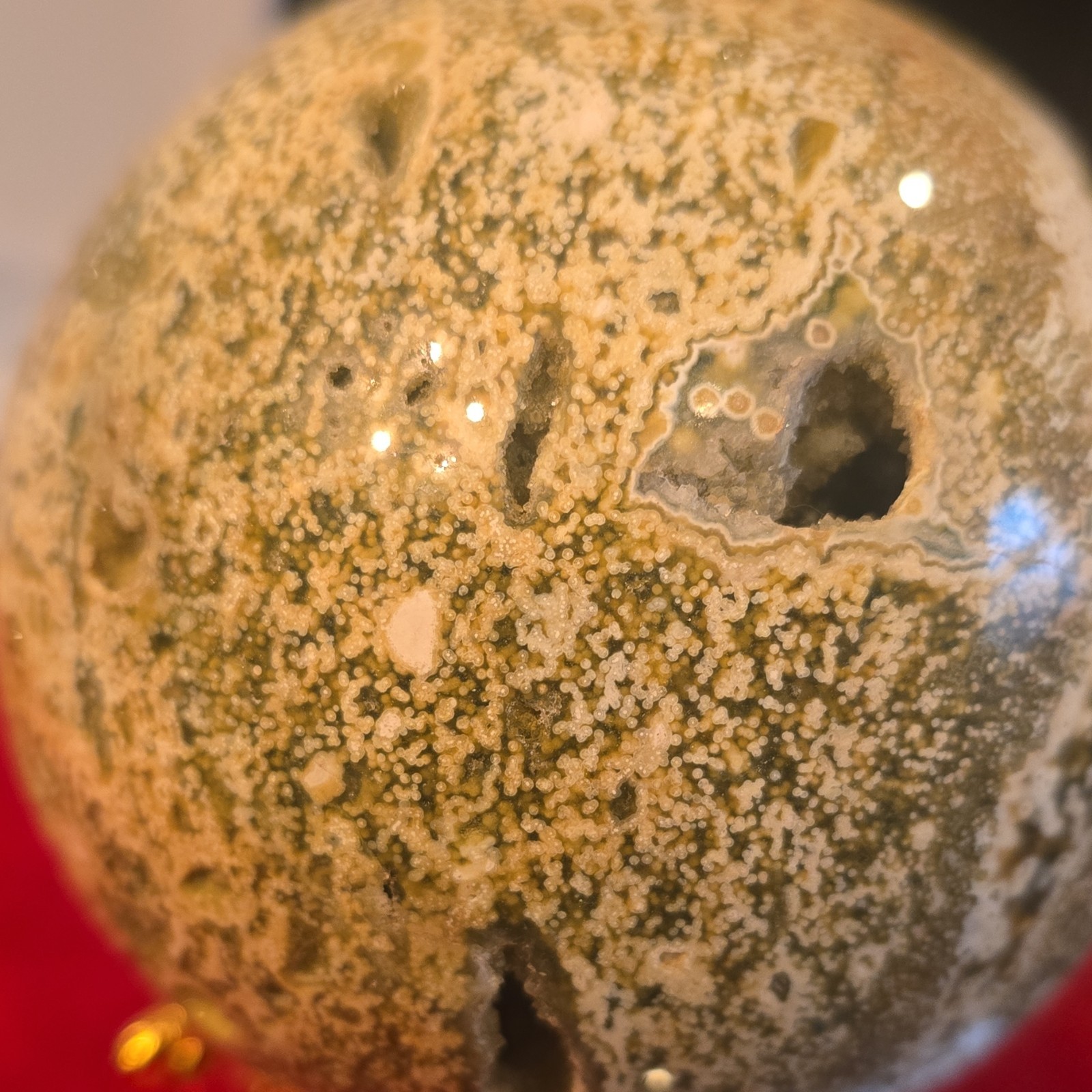 Polished 8th vein Ocean Jasper Sphere Decorative Piece with Stand