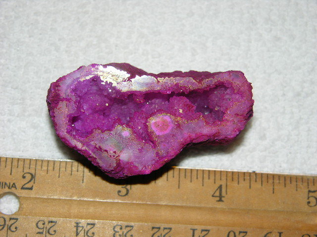 Geode cut & polished half with colored crystal center 2 inch E5