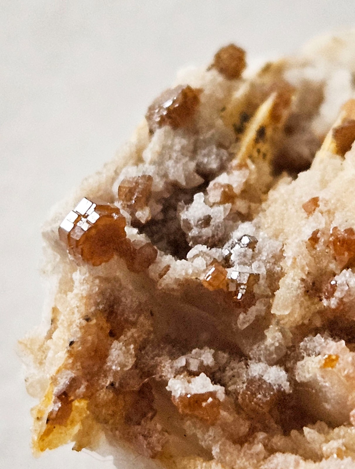 Red and Brown Vanadinite Crystals on white Barite – Mibladen, Morocco