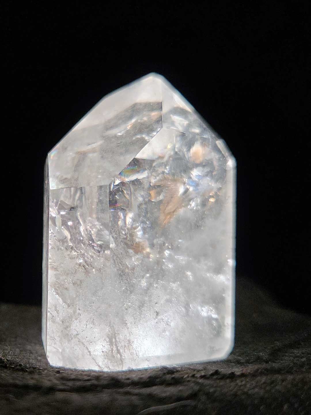 Collection of 9 clear quartz crystal points, 1in. to 3in.