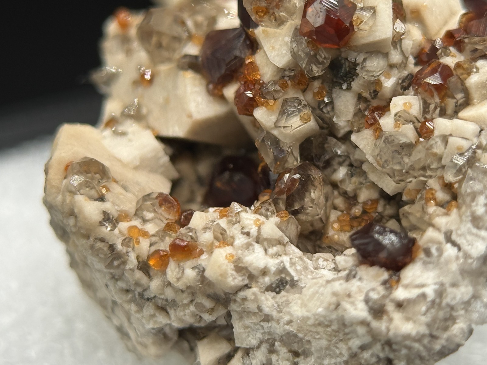 Exceptional spessartine garnets on smoky quartz & microcline from Fujian, China