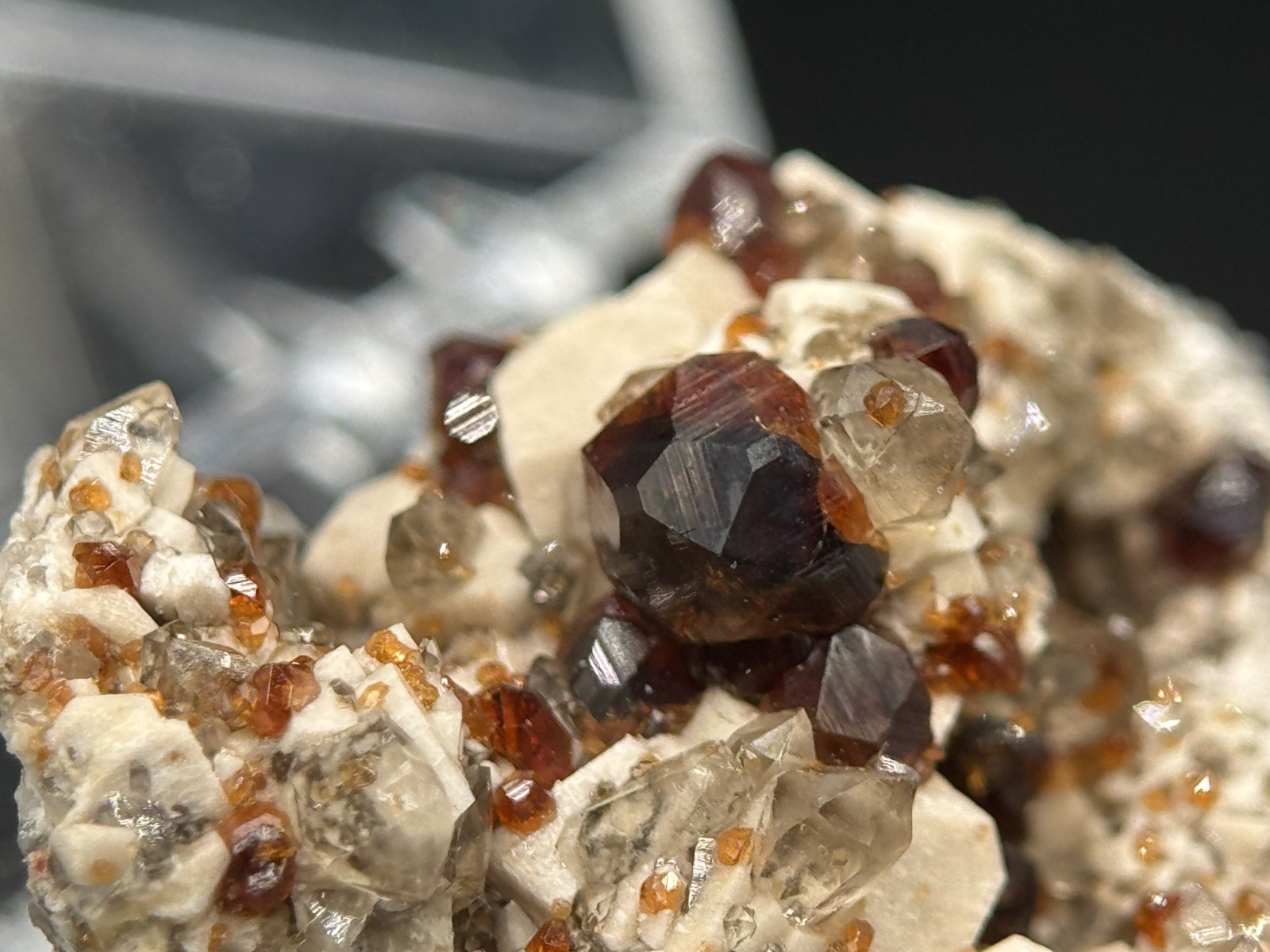 Exceptional spessartine garnets on smoky quartz & microcline from Fujian, China