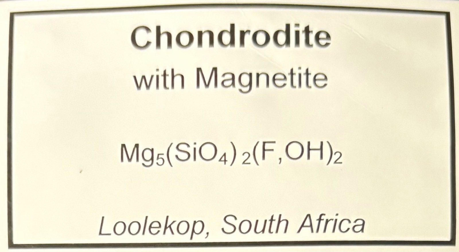 Chondrodite with Magnetite, Quartz & Calcite (UV) – Palabora Mine, South Africa