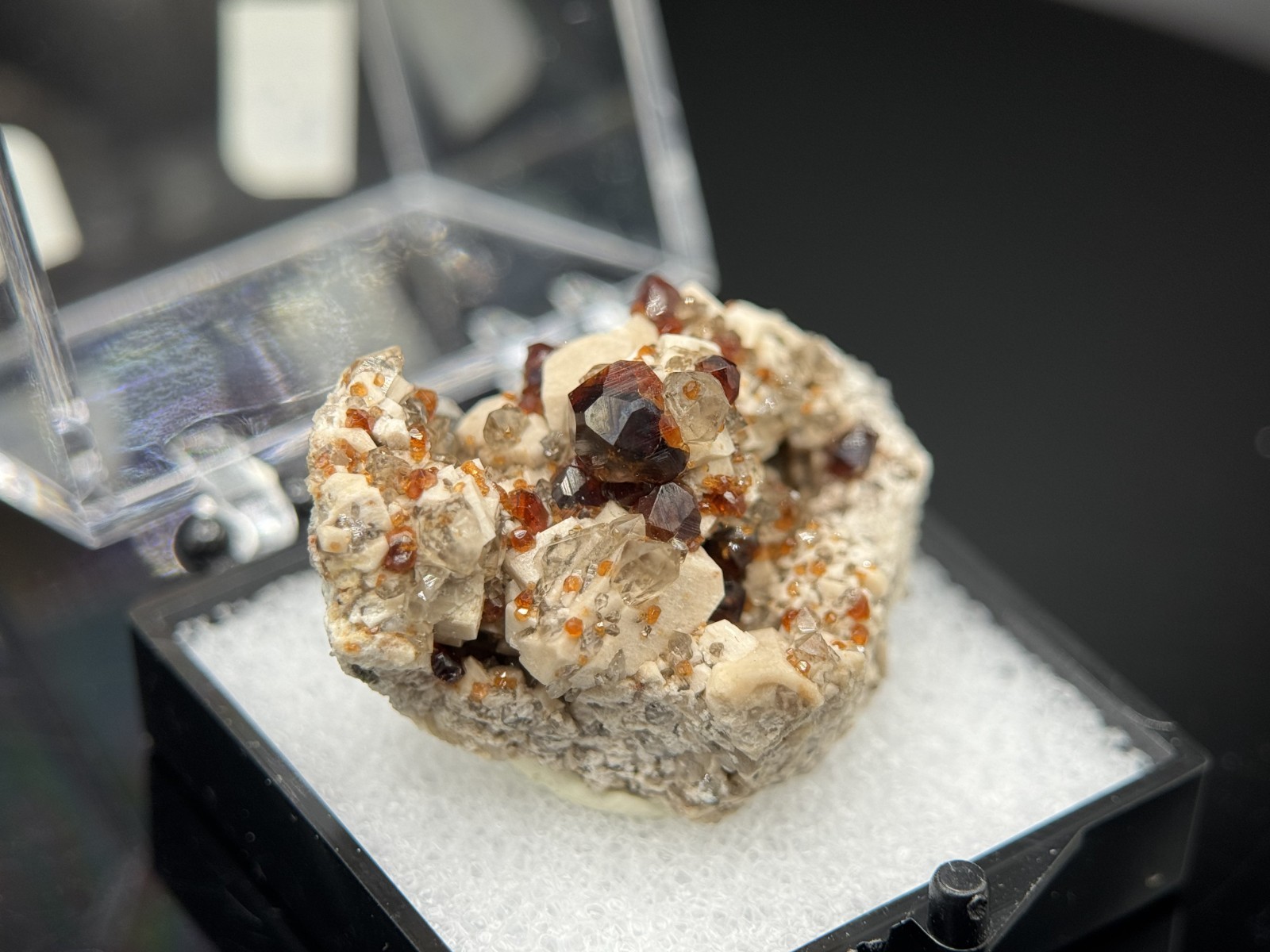 Exceptional spessartine garnets on smoky quartz & microcline from Fujian, China