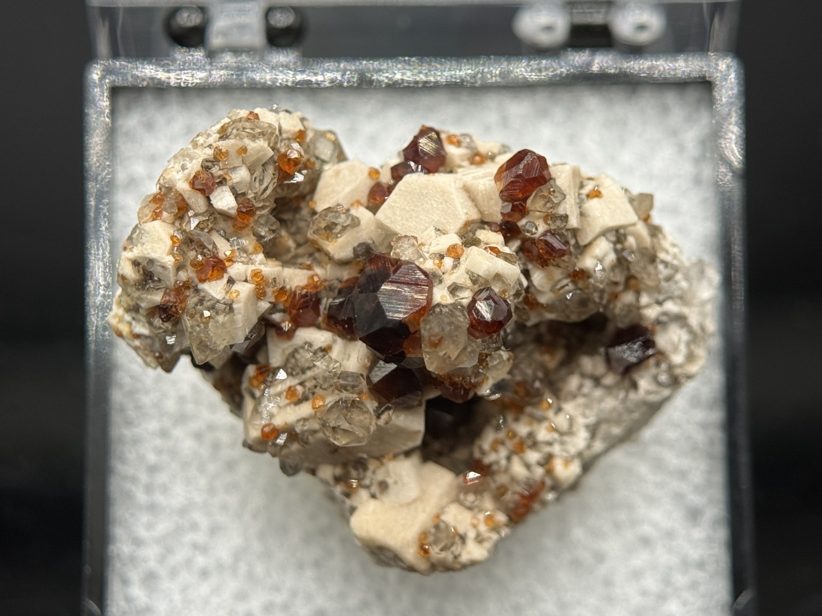 Exceptional spessartine garnets on smoky quartz & microcline from Fujian, China