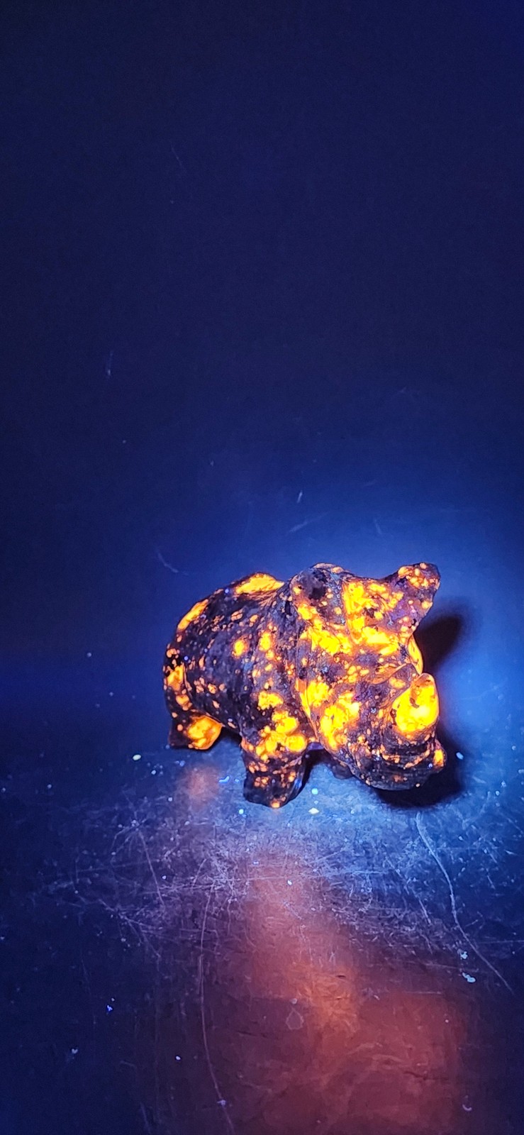 Flame stone “yooperlite” rhino! 8.5 ounces, 4 inches long, 2 tall