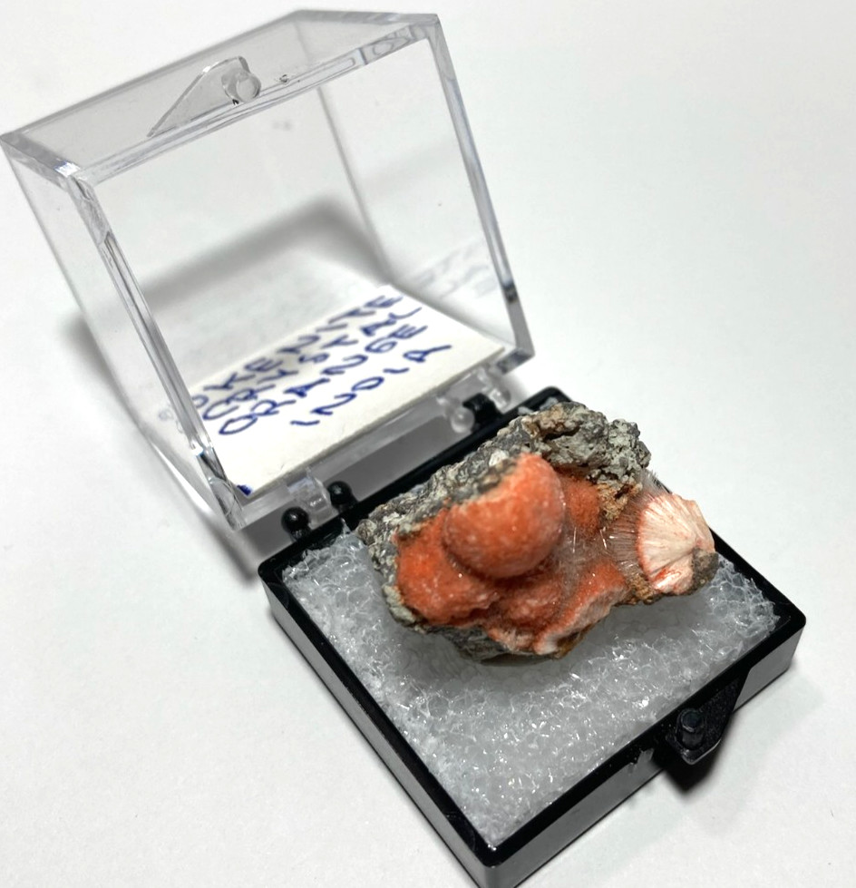 Okenite orange crystals from India Thumbnail