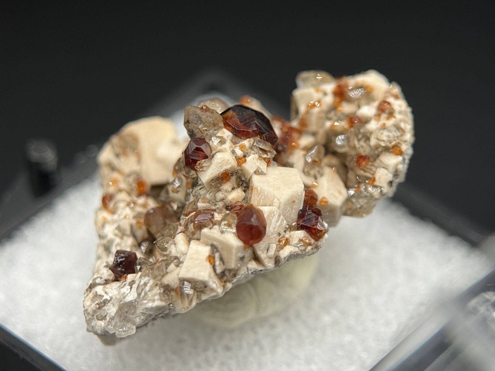 Exceptional spessartine garnets on smoky quartz & microcline from Fujian, China