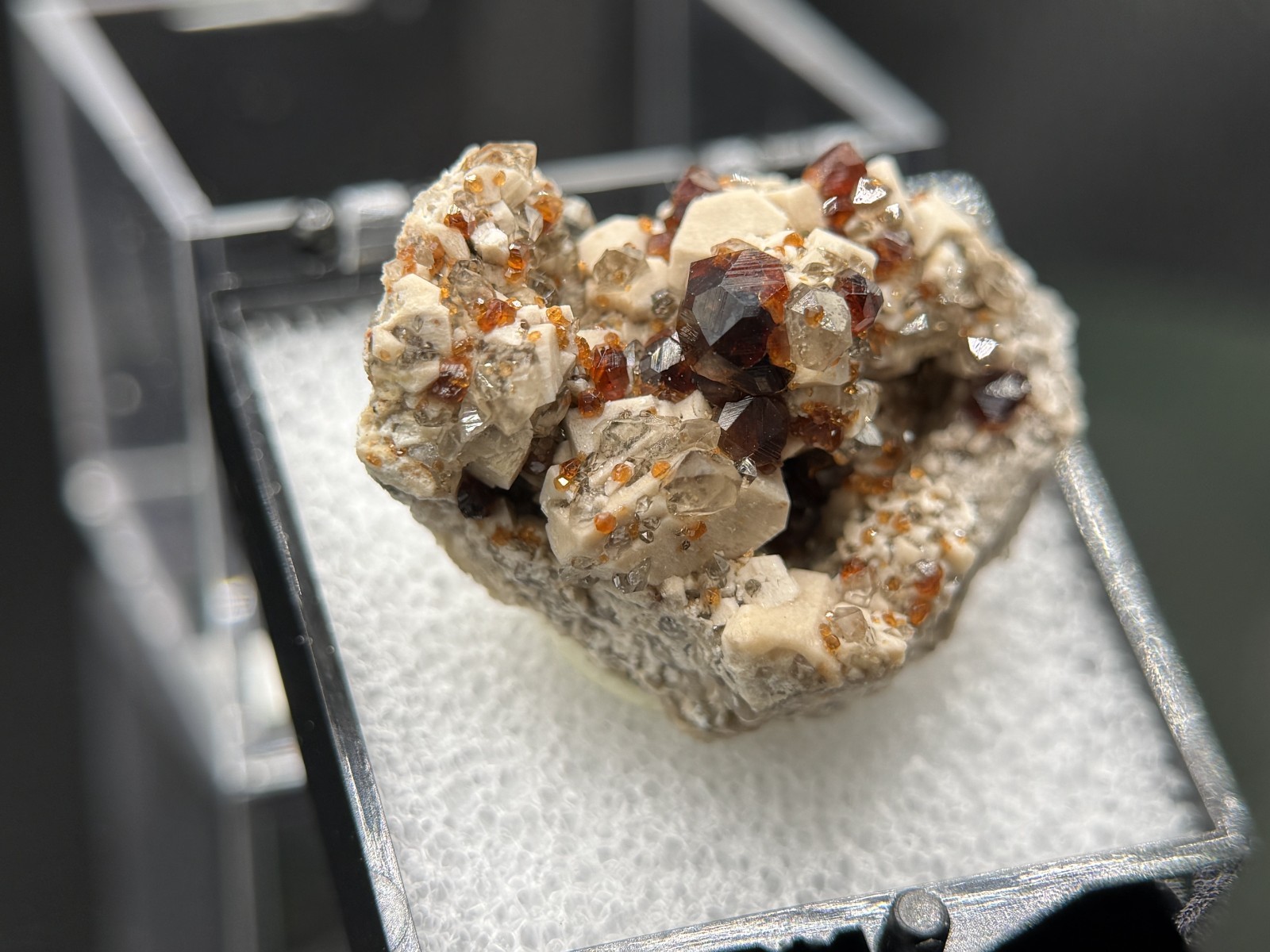 Exceptional spessartine garnets on smoky quartz & microcline from Fujian, China