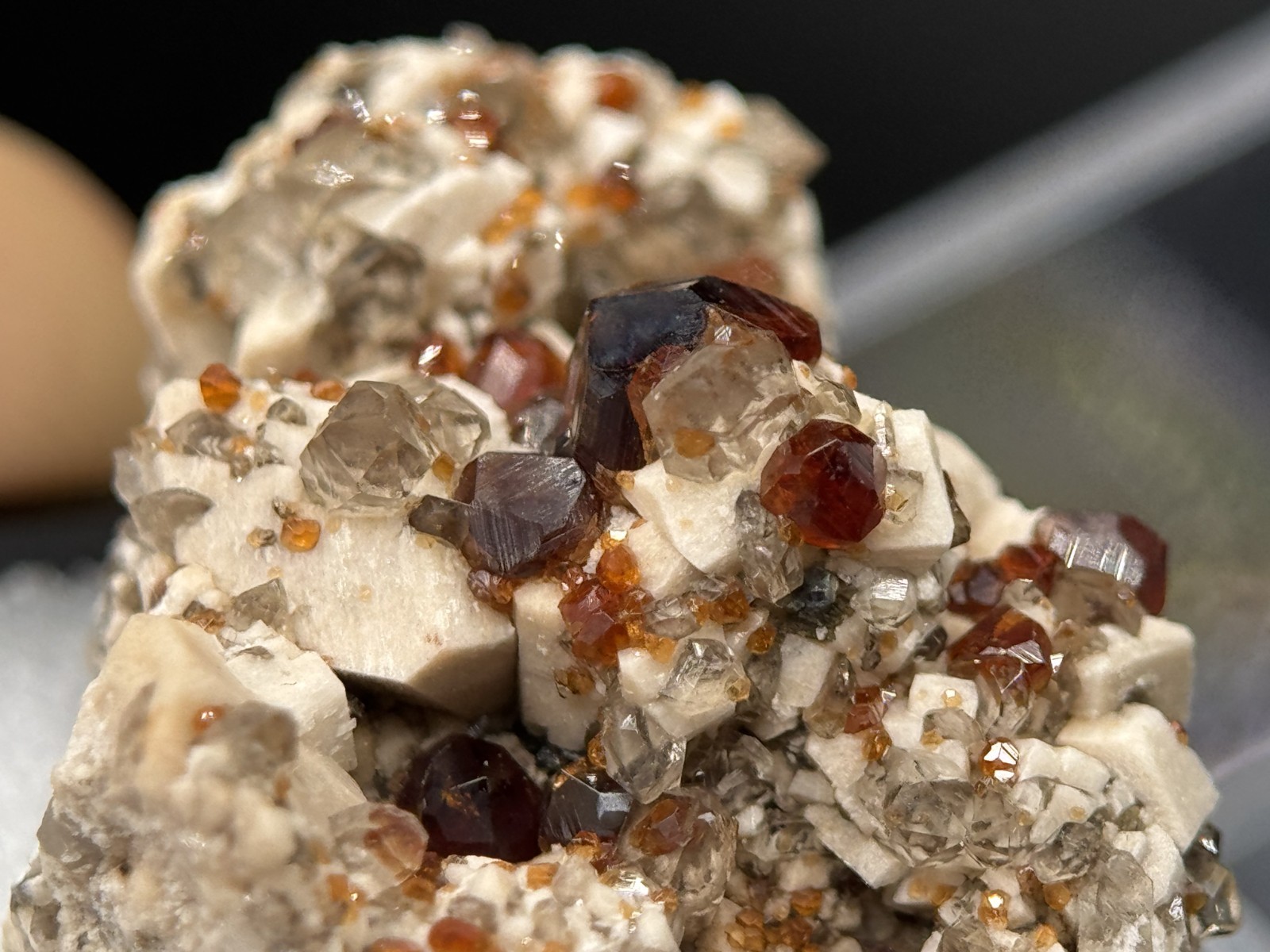 Exceptional spessartine garnets on smoky quartz & microcline from Fujian, China
