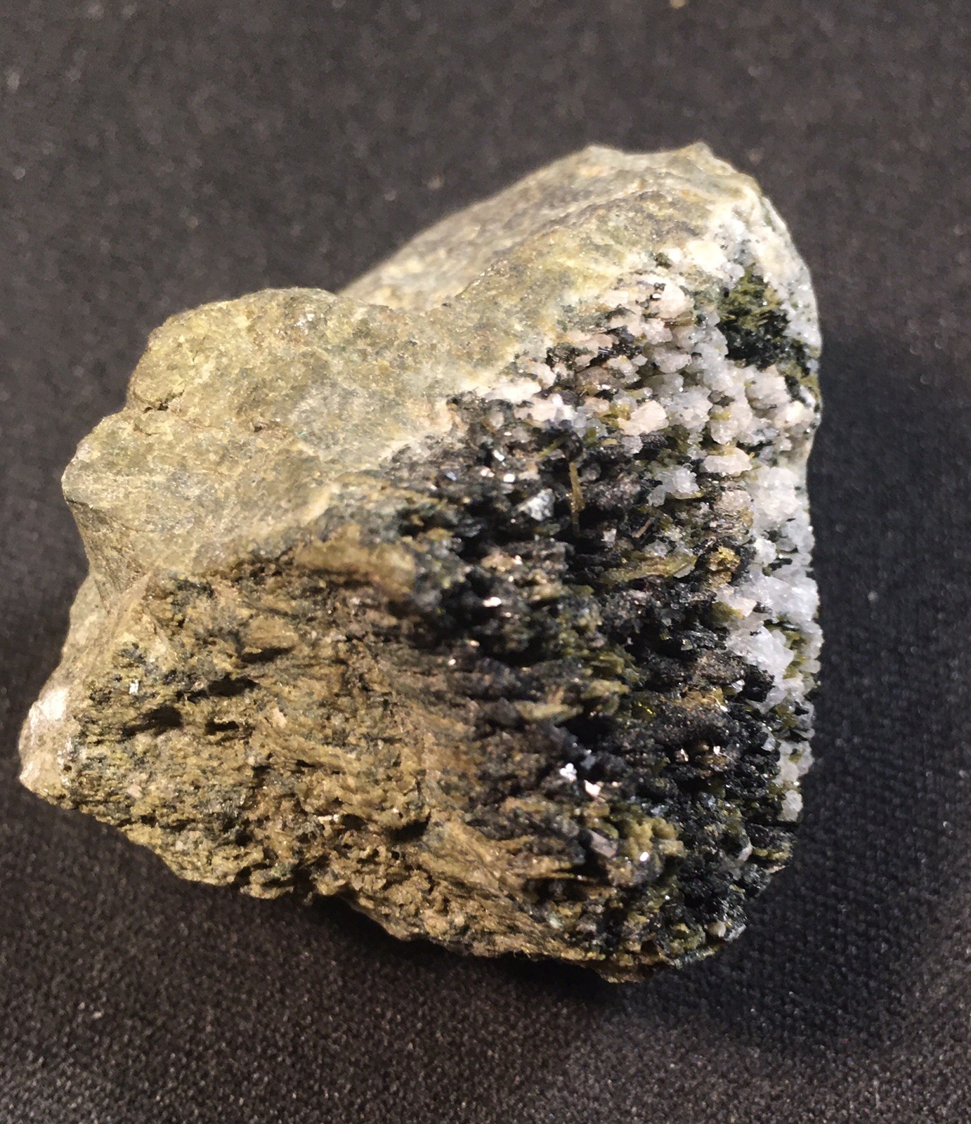Epidote with Adularia, Achenthal, Tyrol, Austria.