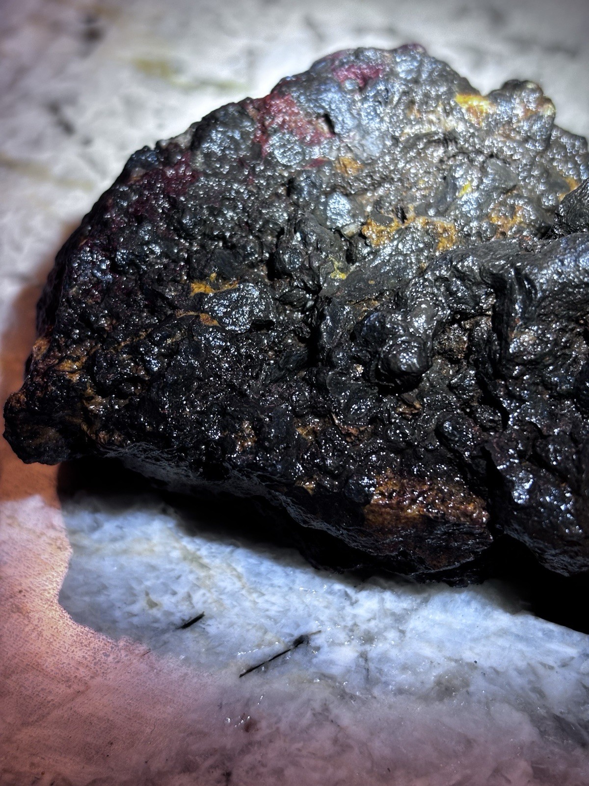 this rock looks like it came from hell! iron ore or silver ore ? meteorite?