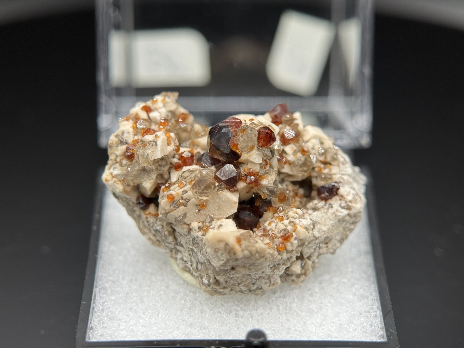 Exceptional spessartine garnets on smoky quartz & microcline from Fujian, China