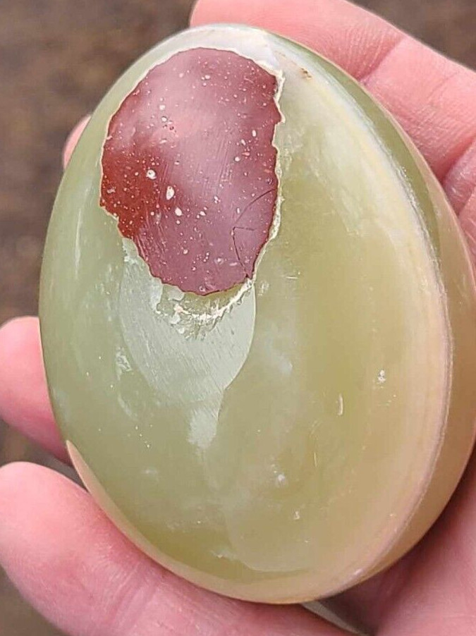 Green Onyx Egg Stone with brown marking. The egg is ~2-3/8″ long and 2″ wide.