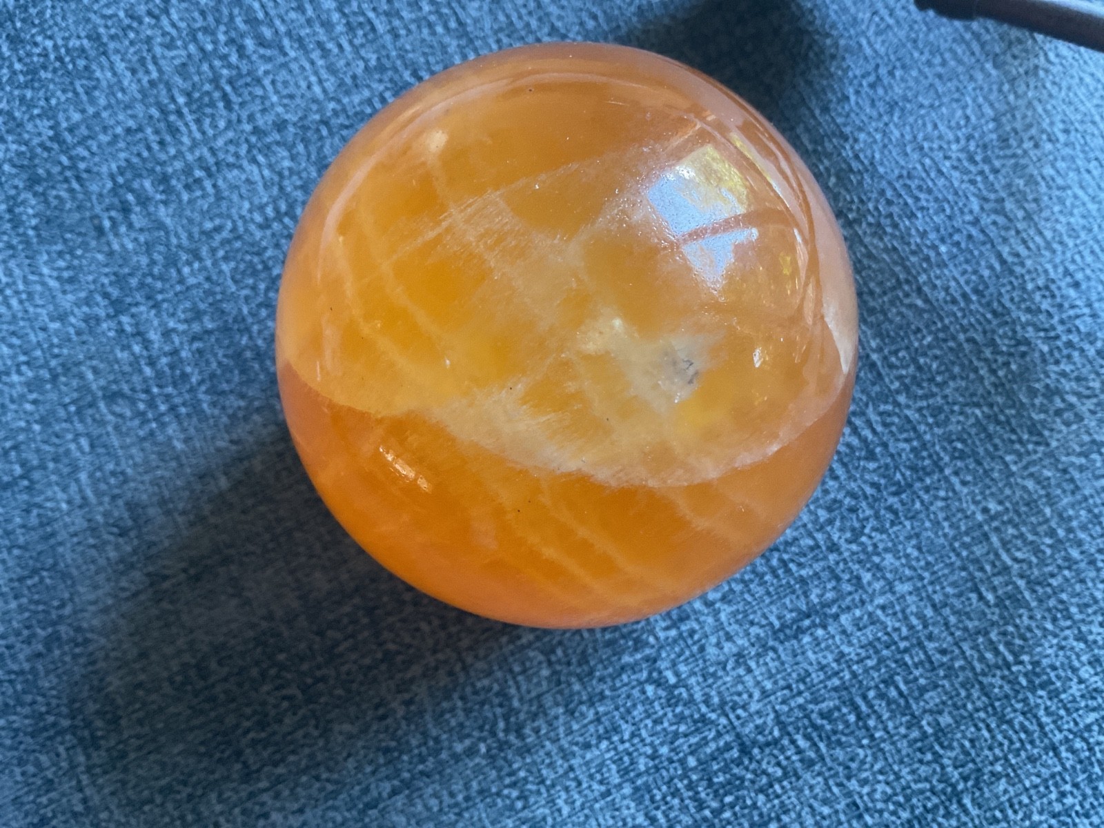 orange stone ball 3″ and arrow tripod stand pewter